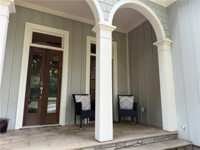 Nestled on a serene, wooded lot with immaculate landscaping and on Moores Mill Golf Club in Alabama - for sale on GolfHomes.com, golf home, golf lot