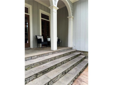 Nestled on a serene, wooded lot with immaculate landscaping and on Moores Mill Golf Club in Alabama - for sale on GolfHomes.com, golf home, golf lot