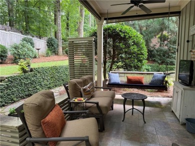 Nestled on a serene, wooded lot with immaculate landscaping and on Moores Mill Golf Club in Alabama - for sale on GolfHomes.com, golf home, golf lot