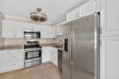 Step into this beautifully updated 2-bedroom, 2-bath first-floor on Palm Aire Country Club of Sarasota in Florida - for sale on GolfHomes.com, golf home, golf lot