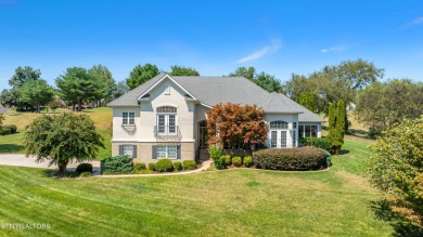 This golf front home on the 14th green is both elegant and on Rarity Bay Country Club - Loudon in Tennessee - for sale on GolfHomes.com, golf home, golf lot