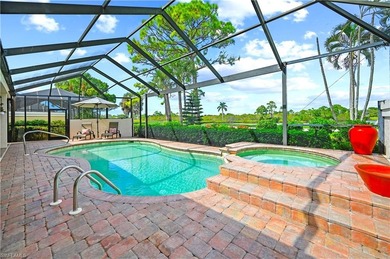 THE ONE YOU HAVE BEEN WAITING FOR! STUNNING POOL HOME WITH WATER on Bonita Bay West in Florida - for sale on GolfHomes.com, golf home, golf lot