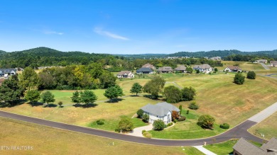 This golf front home on the 14th green is both elegant and on Rarity Bay Country Club - Loudon in Tennessee - for sale on GolfHomes.com, golf home, golf lot