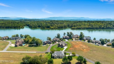 This golf front home on the 14th green is both elegant and on Rarity Bay Country Club - Loudon in Tennessee - for sale on GolfHomes.com, golf home, golf lot