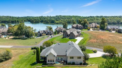 This golf front home on the 14th green is both elegant and on Rarity Bay Country Club - Loudon in Tennessee - for sale on GolfHomes.com, golf home, golf lot