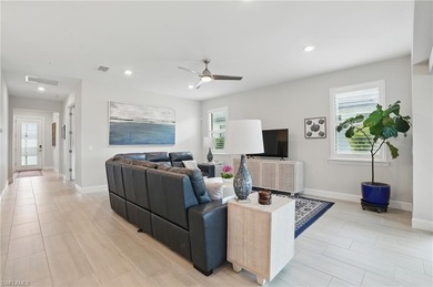 Impress guests with zero-corner sliding doors opening to an on Valencia Golf and Country Club in Florida - for sale on GolfHomes.com, golf home, golf lot