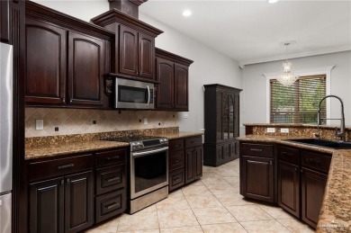 HOME NEVER FLOODED!!! 
Experience serene pond-side living in on Harlingen Country Club in Texas - for sale on GolfHomes.com, golf home, golf lot