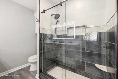 Nestled in the highly desirable Hunting Creek, this beautifully on Hunting Creek Country Club in Kentucky - for sale on GolfHomes.com, golf home, golf lot