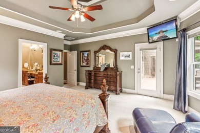 Welcome to Traditions of Braselton, enjoy a beautiful drive thru on Traditions of Braselton Golf Club in Georgia - for sale on GolfHomes.com, golf home, golf lot
