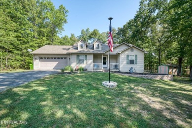 Step into this beautifully maintained 3-bedroom, 2-bathroom home on Lake Tansi Village Country Club in Tennessee - for sale on GolfHomes.com, golf home, golf lot