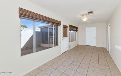 Welcome to this charming 3-bedroom, 2-bath townhouse in the on Sun City Lakes West and East in Arizona - for sale on GolfHomes.com, golf home, golf lot