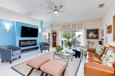 Gorgeously remodeled lakefront home with over $84,000 in on Spanish Lakes Fairways in Florida - for sale on GolfHomes.com, golf home, golf lot