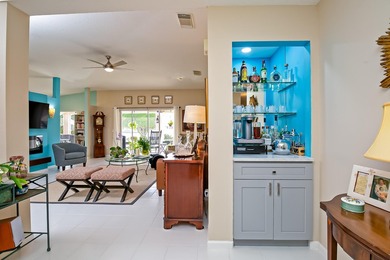 Gorgeously remodeled lakefront home with over $84,000 in on Spanish Lakes Fairways in Florida - for sale on GolfHomes.com, golf home, golf lot