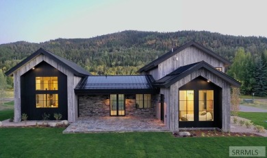 Positioned on the 18th green of the prestigious Teton Springs on Teton Springs Resort and Club in Idaho - for sale on GolfHomes.com, golf home, golf lot