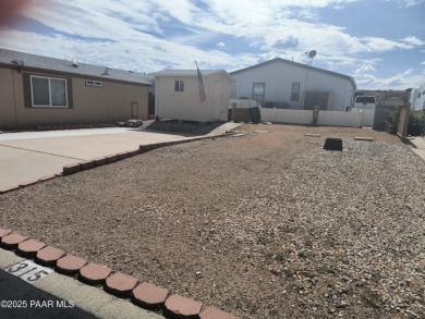 YOUR CHANCE TO OWN YOUR OWN LOT IN THE DESIRABLE VILLAGES AT on Quail Wood Greens Golf Course in Arizona - for sale on GolfHomes.com, golf home, golf lot