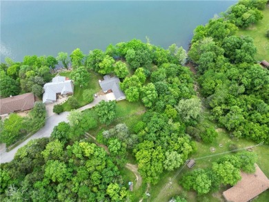 Live the *island* life on a .77 acre inlet lot that's nestled at on Holiday Island Executive Golf Course in Arkansas - for sale on GolfHomes.com, golf home, golf lot