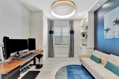 Elegance meets coastal style in this former model home! on Orchid Island Golf and Beach Club in Florida - for sale on GolfHomes.com, golf home, golf lot