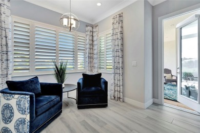 Elegance meets coastal style in this former model home! on Orchid Island Golf and Beach Club in Florida - for sale on GolfHomes.com, golf home, golf lot