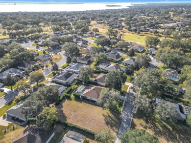 Build your dream home on this large residential lot in the on Harbor Hills Country Club in Florida - for sale on GolfHomes.com, golf home, golf lot