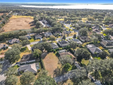 Build your dream home on this large residential lot in the on Harbor Hills Country Club in Florida - for sale on GolfHomes.com, golf home, golf lot