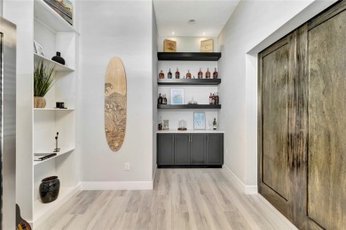 Elegance meets coastal style in this former model home! on Orchid Island Golf and Beach Club in Florida - for sale on GolfHomes.com, golf home, golf lot