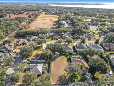 Build your dream home on this large residential lot in the on Harbor Hills Country Club in Florida - for sale on GolfHomes.com, golf home, golf lot