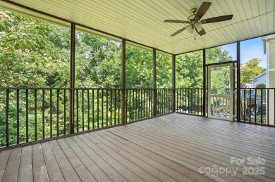 The main level features a office, dining room and a kitchen that on Highland Creek Golf Club in North Carolina - for sale on GolfHomes.com, golf home, golf lot
