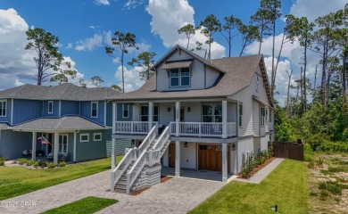 Welcome to coastal luxury in Sanctuary Beach--where nature on Bay Point Resort Golf Club in Florida - for sale on GolfHomes.com, golf home, golf lot