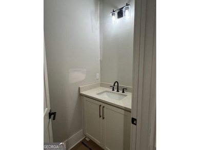 Luxury living awaits in River Forest, a premier swim, golf, and on The Club River Forest in Georgia - for sale on GolfHomes.com, golf home, golf lot