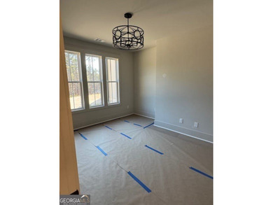 Luxury living awaits in River Forest, a premier swim, golf, and on The Club River Forest in Georgia - for sale on GolfHomes.com, golf home, golf lot