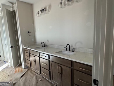 Luxury living awaits in River Forest, a premier swim, golf, and on The Club River Forest in Georgia - for sale on GolfHomes.com, golf home, golf lot