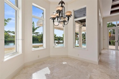 Beautiful waterfront property on a point lot with 260' of on North Palm Beach Country Club in Florida - for sale on GolfHomes.com, golf home, golf lot