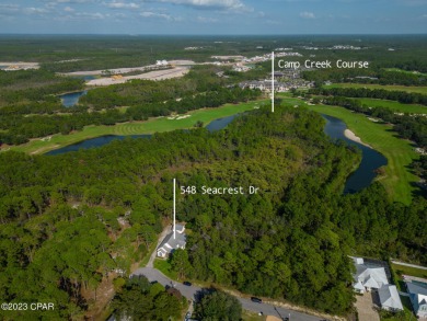 Discover Your Dream Home in a Tranquil Oasis! Welcome to your on Camp Creek Golf Course in Florida - for sale on GolfHomes.com, golf home, golf lot