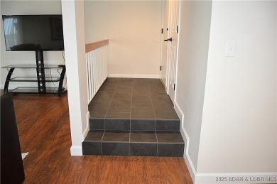This 2 bedroom 2 bath condo lives LARGE with approximately 1,250 on Seasons Ridge At Four Seasons in Missouri - for sale on GolfHomes.com, golf home, golf lot