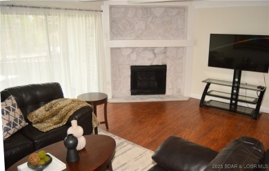 This 2 bedroom 2 bath condo lives LARGE with approximately 1,250 on Seasons Ridge At Four Seasons in Missouri - for sale on GolfHomes.com, golf home, golf lot
