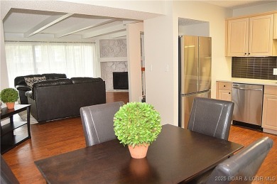 This 2 bedroom 2 bath condo lives LARGE with approximately 1,250 on Seasons Ridge At Four Seasons in Missouri - for sale on GolfHomes.com, golf home, golf lot