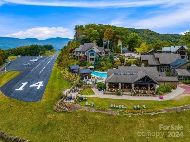 Nestled in a Fly-in/Fly-out community, this mountain retreat on Mountain Air Country Club in North Carolina - for sale on GolfHomes.com, golf home, golf lot