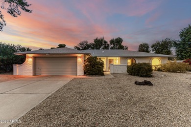 Open and bright living spaces flow from the crisp white kitchen on Gainey Ranch Golf Club in Arizona - for sale on GolfHomes.com, golf home, golf lot