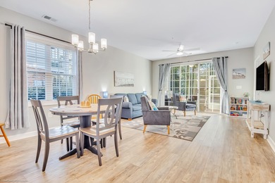 Welcome to this rare first-floor end unit in highly sought-after on Barefoot Resort and Golf Club  in South Carolina - for sale on GolfHomes.com, golf home, golf lot