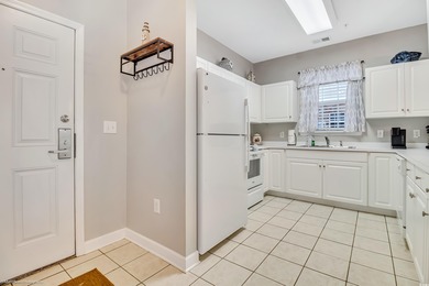 Welcome to this rare first-floor end unit in highly sought-after on Barefoot Resort and Golf Club  in South Carolina - for sale on GolfHomes.com, golf home, golf lot