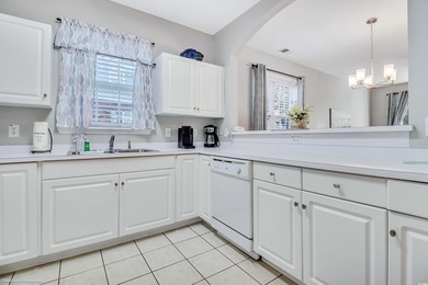 Welcome to this rare first-floor end unit in highly sought-after on Barefoot Resort and Golf Club  in South Carolina - for sale on GolfHomes.com, golf home, golf lot