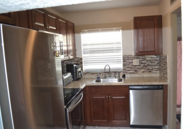 Recently renovated 2/2 Condominium with a Nice Lake View located on Sunrise Lakes Phase III in Florida - for sale on GolfHomes.com, golf home, golf lot