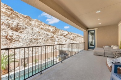 This exquisite two-story home offers 4,569 square feet of on Southern Highlands Golf Club in Nevada - for sale on GolfHomes.com, golf home, golf lot