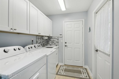 This beautiful 5-bedroom, 4-bath home in Magnolia Point Golf & on Magnolia Point Golf and Country Club in Florida - for sale on GolfHomes.com, golf home, golf lot