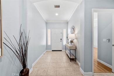 This beautifully maintained Trento model is located in The Oasis on Menifee Lakes Country Club - Lakes in California - for sale on GolfHomes.com, golf home, golf lot