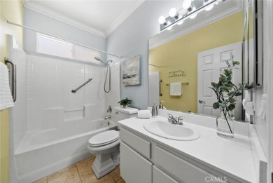 This beautifully maintained Trento model is located in The Oasis on Menifee Lakes Country Club - Lakes in California - for sale on GolfHomes.com, golf home, golf lot