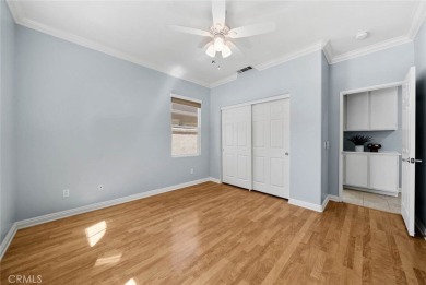 This beautifully maintained Trento model is located in The Oasis on Menifee Lakes Country Club - Lakes in California - for sale on GolfHomes.com, golf home, golf lot