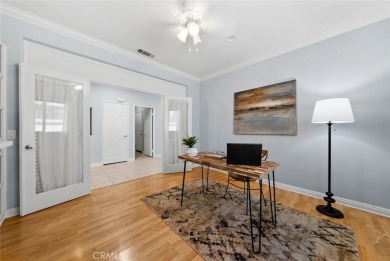 This beautifully maintained Trento model is located in The Oasis on Menifee Lakes Country Club - Lakes in California - for sale on GolfHomes.com, golf home, golf lot