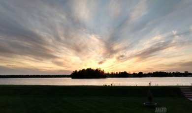 Stunning End-Unit Condo on Lake Lancer -- A Rare Lakeside Gem on Lakeside Golf Course in Michigan - for sale on GolfHomes.com, golf home, golf lot