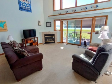 Stunning End-Unit Condo on Lake Lancer -- A Rare Lakeside Gem on Lakeside Golf Course in Michigan - for sale on GolfHomes.com, golf home, golf lot